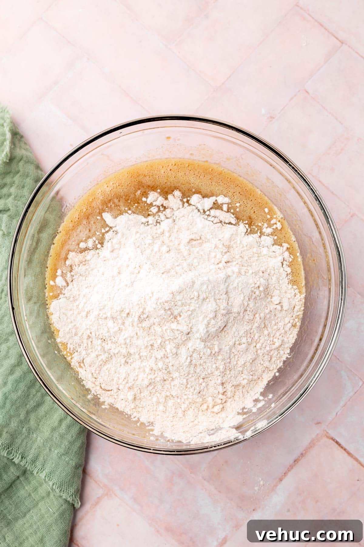 Moist Gluten-Free Zucchini Muffins with Cinnamon Oil-Free Option 7 Combining wet and dry ingredients.