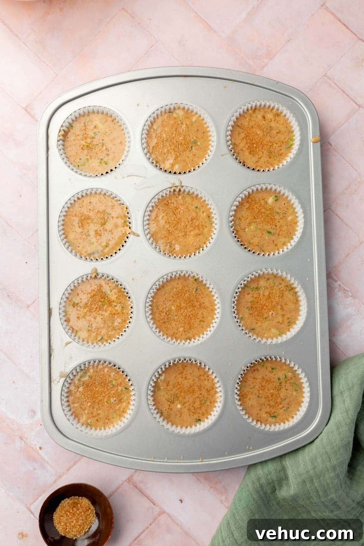 Moist Gluten-Free Zucchini Muffins with Cinnamon Oil-Free Option 9 Muffin tin filled with batter.