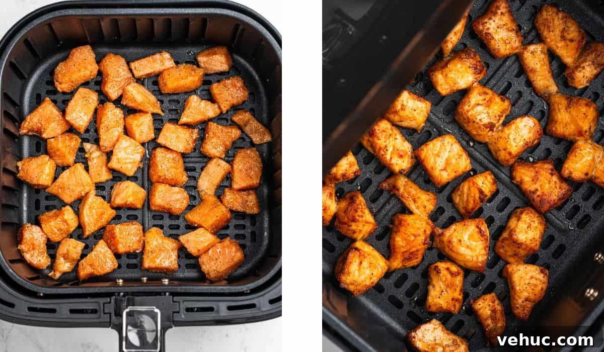 Crispy Air Fryer Salmon Bites with Lemon Garlic Dip 6 Process of laying salmon bites into air fryer and air frying.