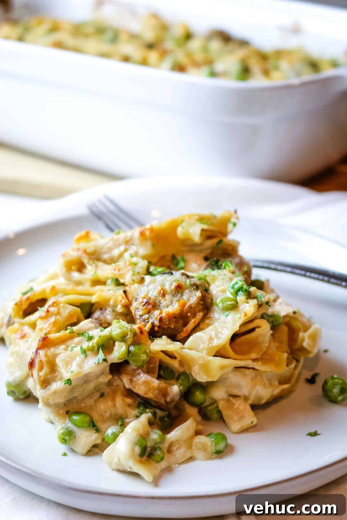 Tuna Noodle Casserole from Scratch (No Canned Soup) 4 tuna noodle casserole on white plate.