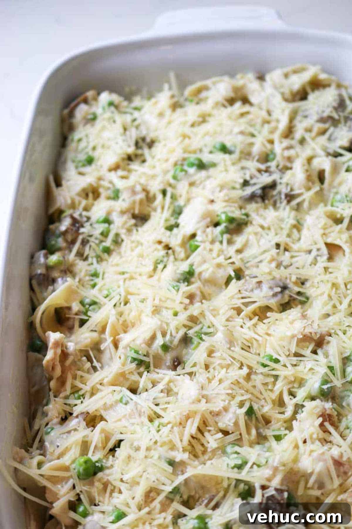 Tuna Noodle Casserole from Scratch (No Canned Soup) 10 cheese on top on casserole in dish.