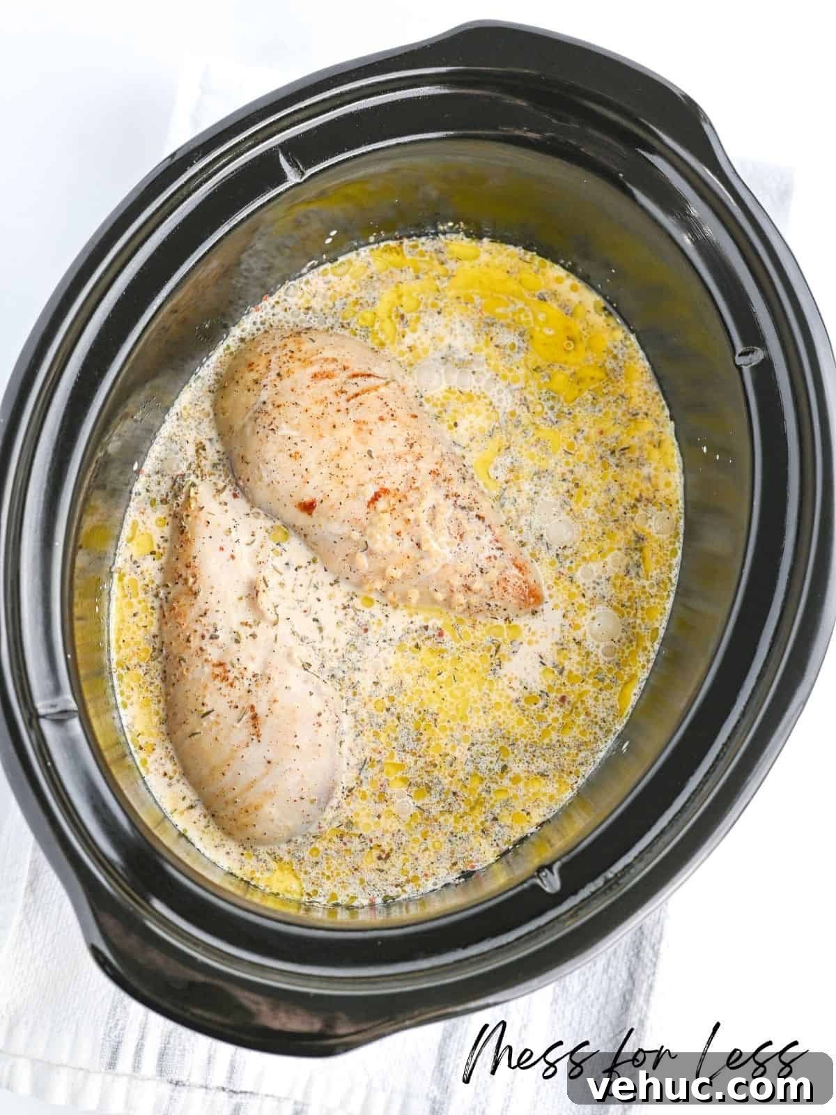Crockpot Marry Me Chicken Recipe for Tender, Creamy Flavor 8 chicken breasts cooking in slow cooker