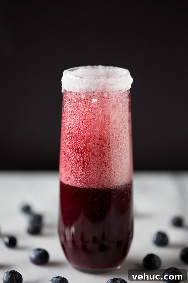 Sparkling Mixed Berry Bellini Recipe: Fresh Summer Cocktail 4 This mixed berry bellini is perfectly sweet and packed full of blueberry and strawberry flavor. Served with a sugar rim and topped with sweet sparkling wine or prosecco.