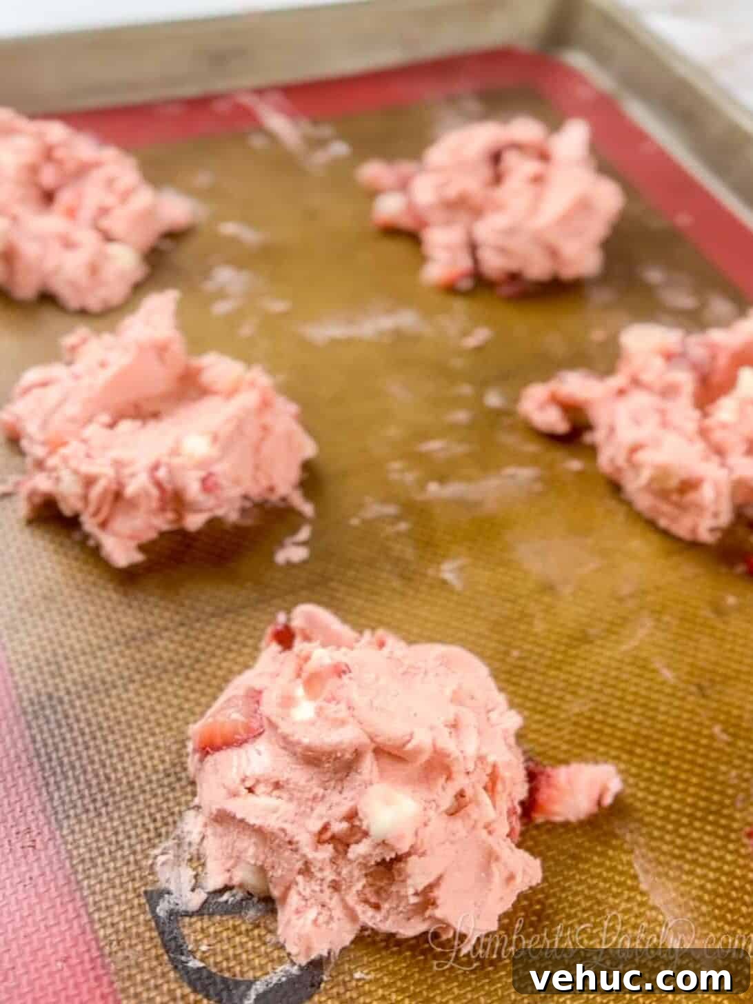Strawberry Cheesecake Cookies Made with Cake Mix 8 cookie dough folded around cream cheese.