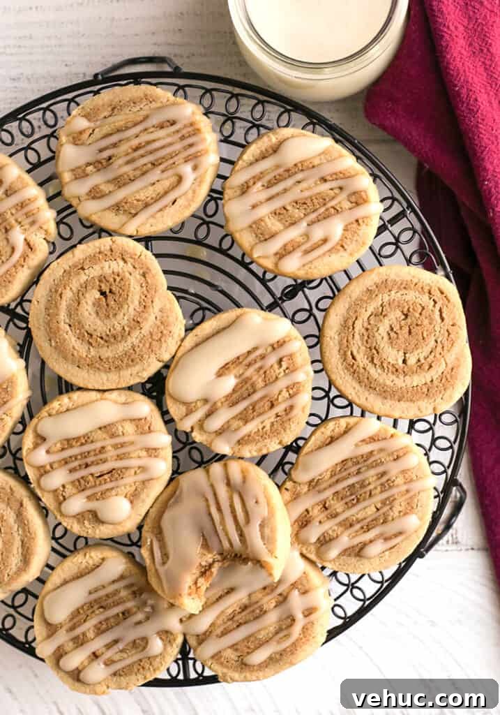 Paleo Cinnamon Roll Cookie Recipe — Soft, Low-Carb Treats 4 top shot of paleo cinnamon roll cookies. Some with glaze and some plain
