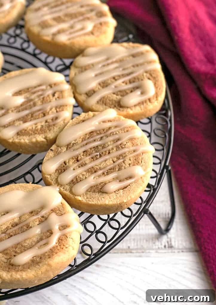 Paleo Cinnamon Roll Cookie Recipe — Soft, Low-Carb Treats 5 paleo cinnamon roll cookies on a cooling rack