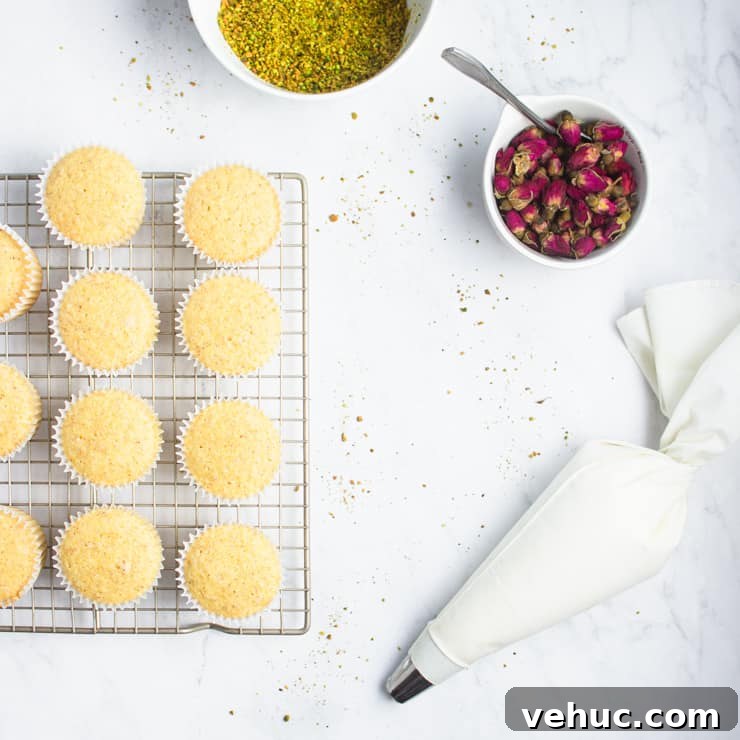 Persian Love Cake Cupcakes: Saffron Rose Water Dessert Recipe 3 overhead photo of cupcakes on a cooling rack