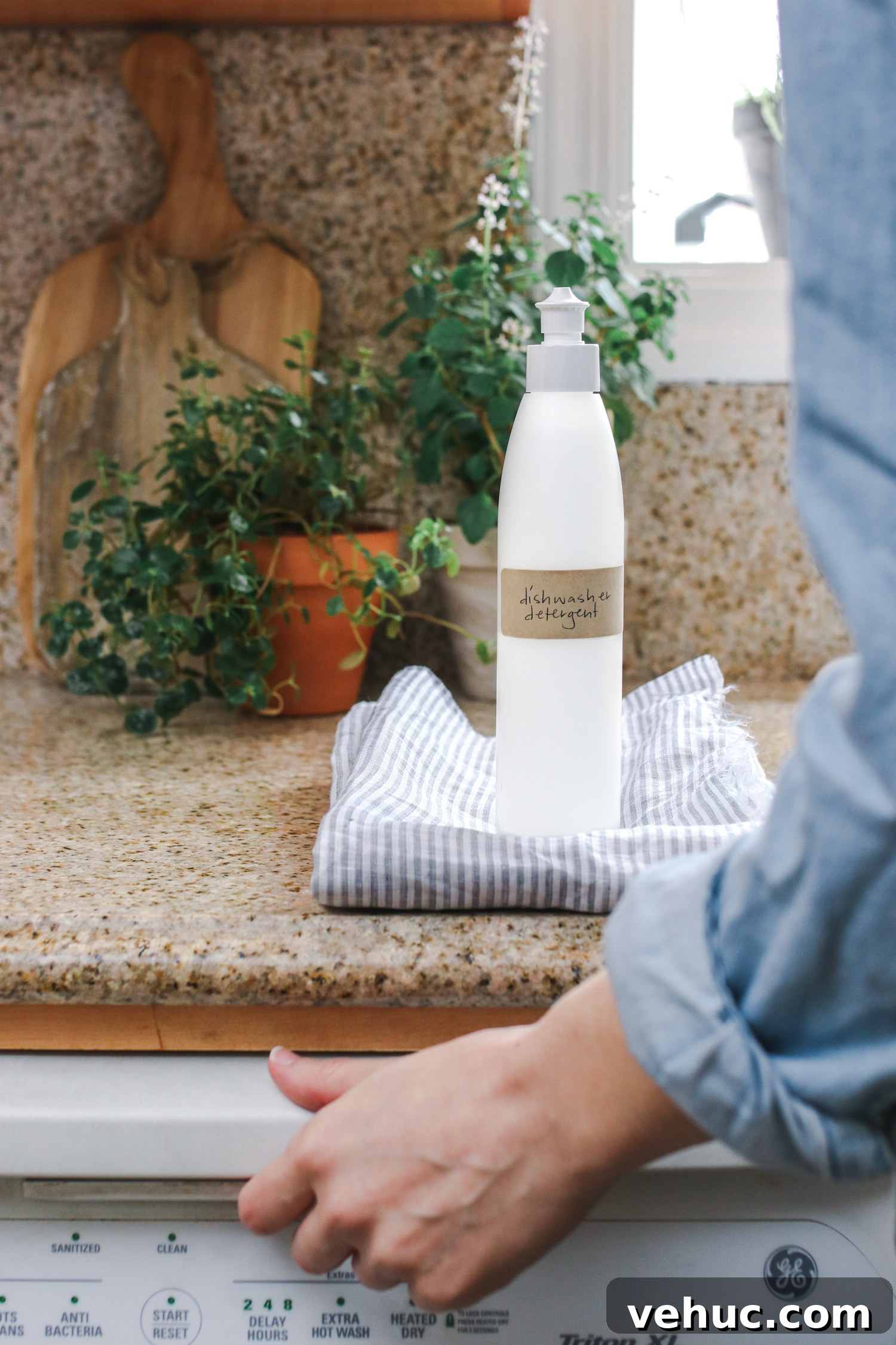 DIY Liquid Dishwasher Detergent with Essential Oils Guide 2 This homemade liquid dishwasher detergent is made with natural ingredients like washing soda and essential oils to get dishes clean without the chemicals.